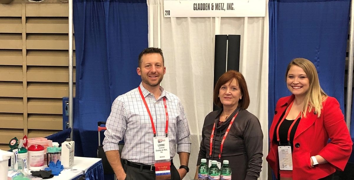 Gladden & Metz, Inc. team at trade show booth